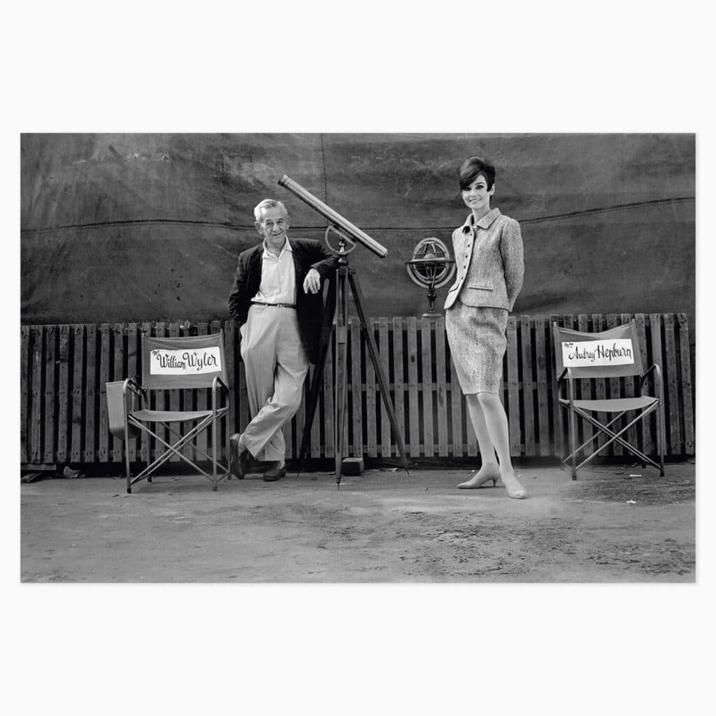 Terry O’Neill limited edition print titled ‘Audrey Hepburn and William Wyler’ depicting the legendary performer and filmmaker in classic photographic style