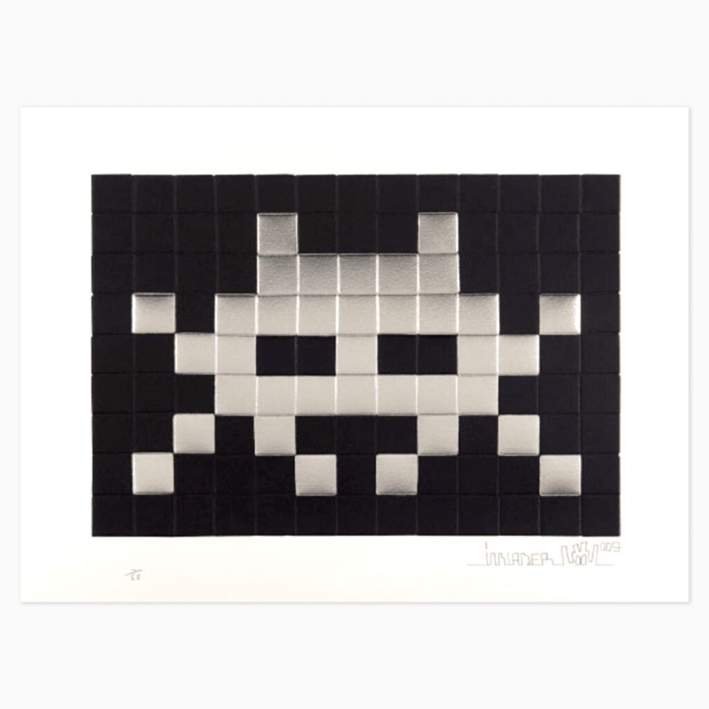 Invasion silver by Invader, a pixelated mosaic artwork composed of small square tiles in shades of black and silver, depicting a Space Invader character