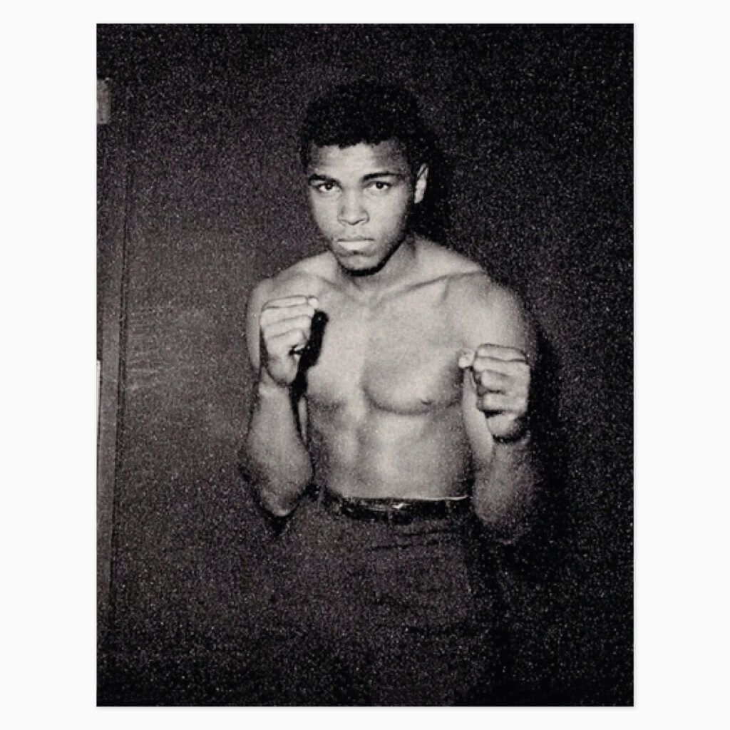 “Muhammed Ali” artwork by Russell Young featuring a bold, pop art portrait of the boxing legend, in his signature vibrant, graphic style.