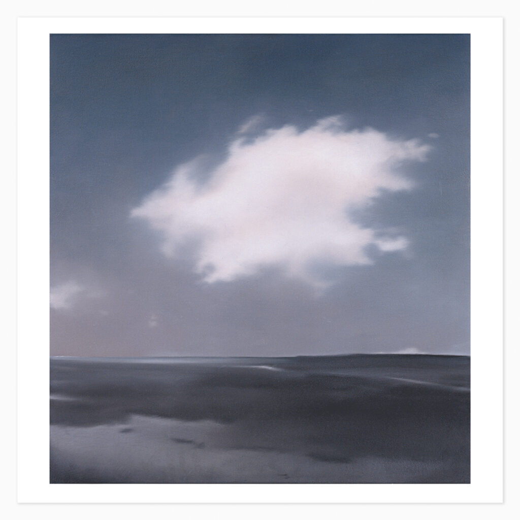 A hazy, blurred photorealistic landscape with a cloud-filled sky, rendered in Richter's characteristic soft, squeegee-smeared style that dissolves detail into atmospheric ambiguity