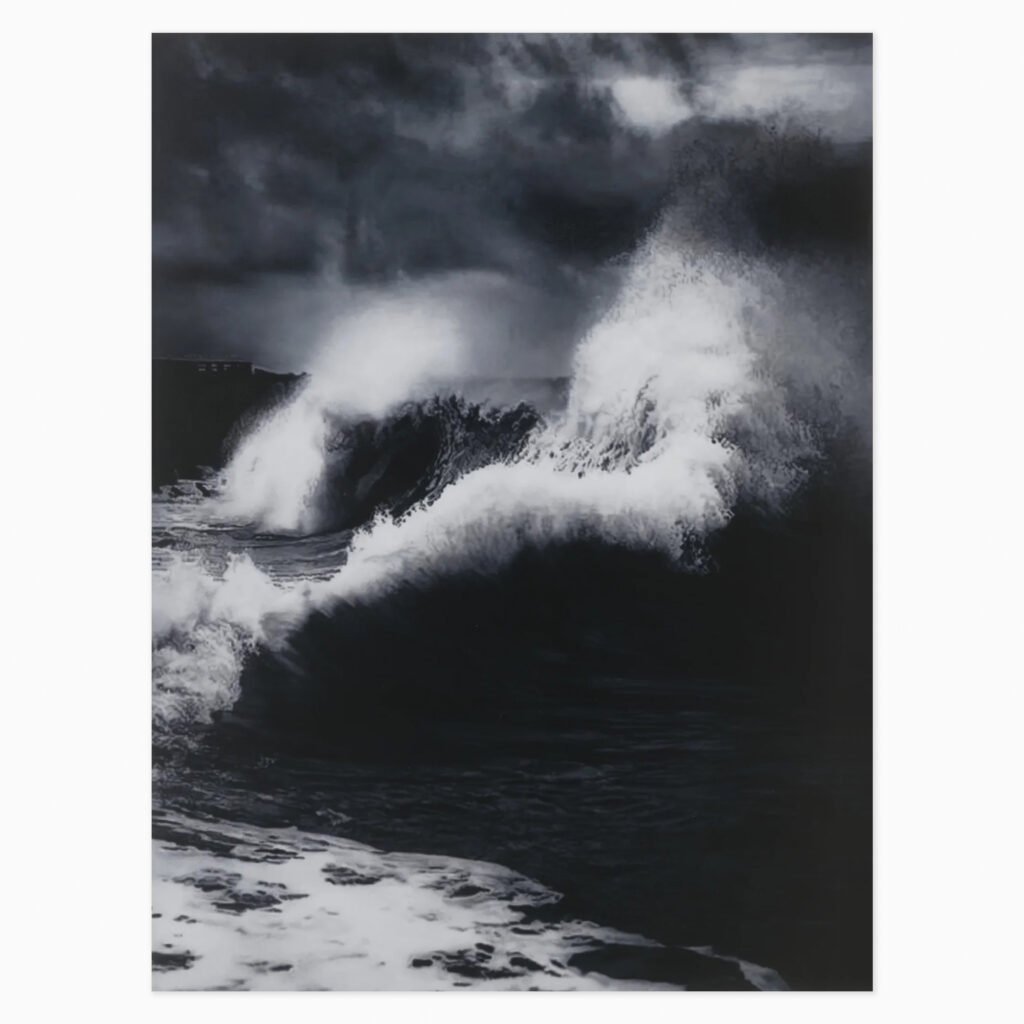 Faneel by Damien Hirst, a print from the Where the Land Meets the Sea series depicting a harsh coastal seascape with atmospheric sky all in black and white