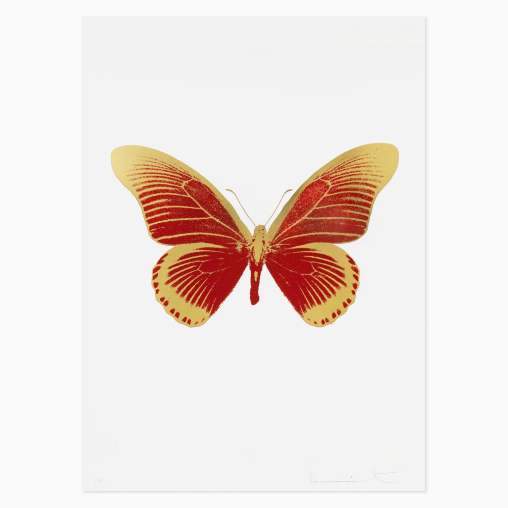 The Souls IV – Chilli Red/Oriental Gold by Damien Hirst, a foil block print featuring a butterfly with intricately patterned wings in vivid chilli red and oriental gold, creating a bold, symmetrical composition.